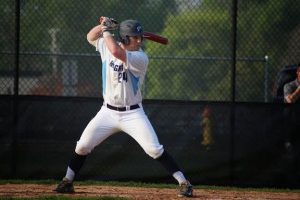 FACE OFF: Senior Luke Karz stares down the pitcher as he awaits the next pitch. Against Warren in the regional final, Karz had a key double in the fourth inning that kept the Knights close. Later that inning he scored on a past ball even though his run was not enough for the Knights in their 7-2 loss.