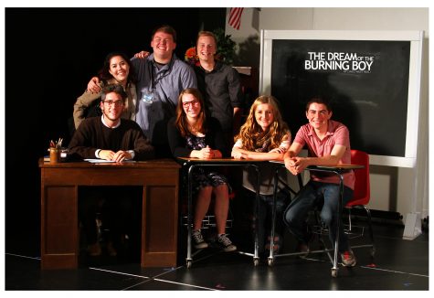The cast poses for a group photo.