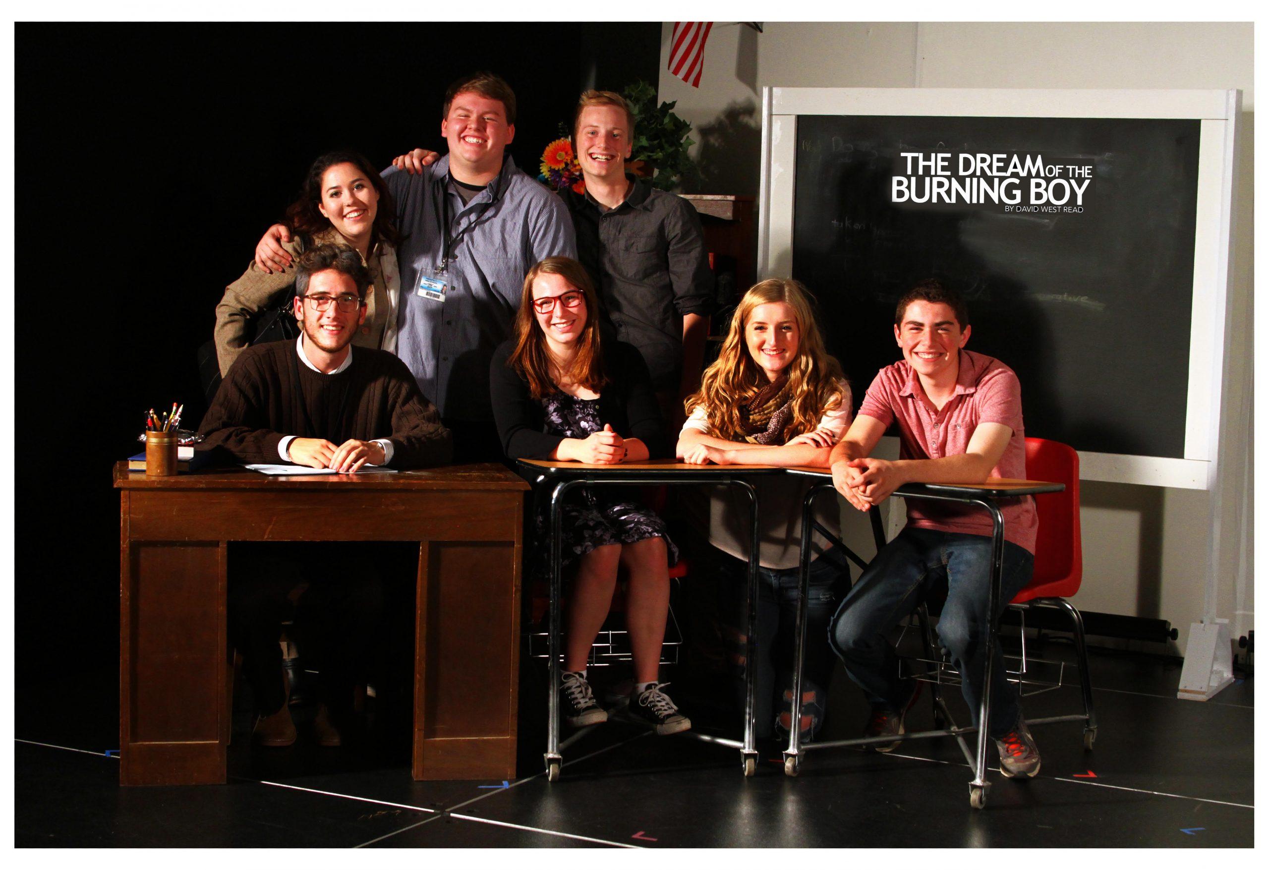 The cast poses for a group photo.