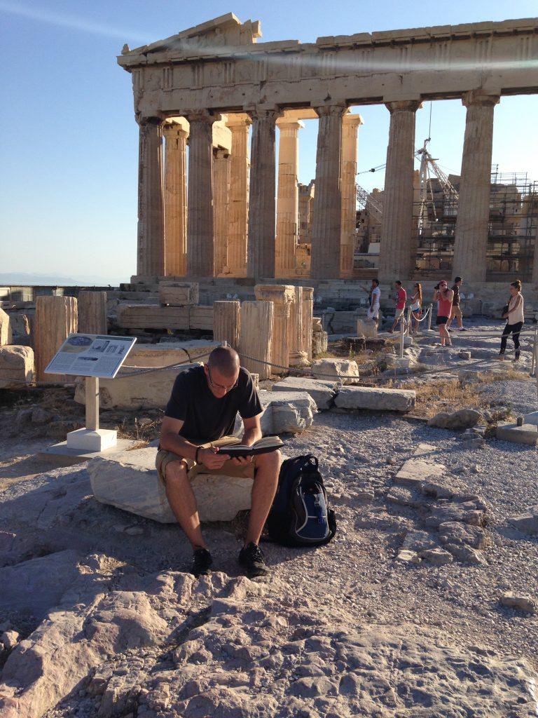 World Religions teacher John Camardella poses in front of the Acropolis in Greece. He frequently travels to other countries to gain perspective for how to better teach his classes. (photo courtesy of John Camardella)