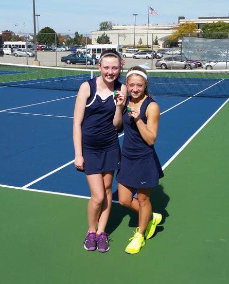 Juniors Colleen Stanford and Annie Walsh stand with their medals after winning fifth place at third doubles in the MSL Conference Meet in October of 2015. The team finished fifth overall in the MSL, but the team knows that they can do even better this season.