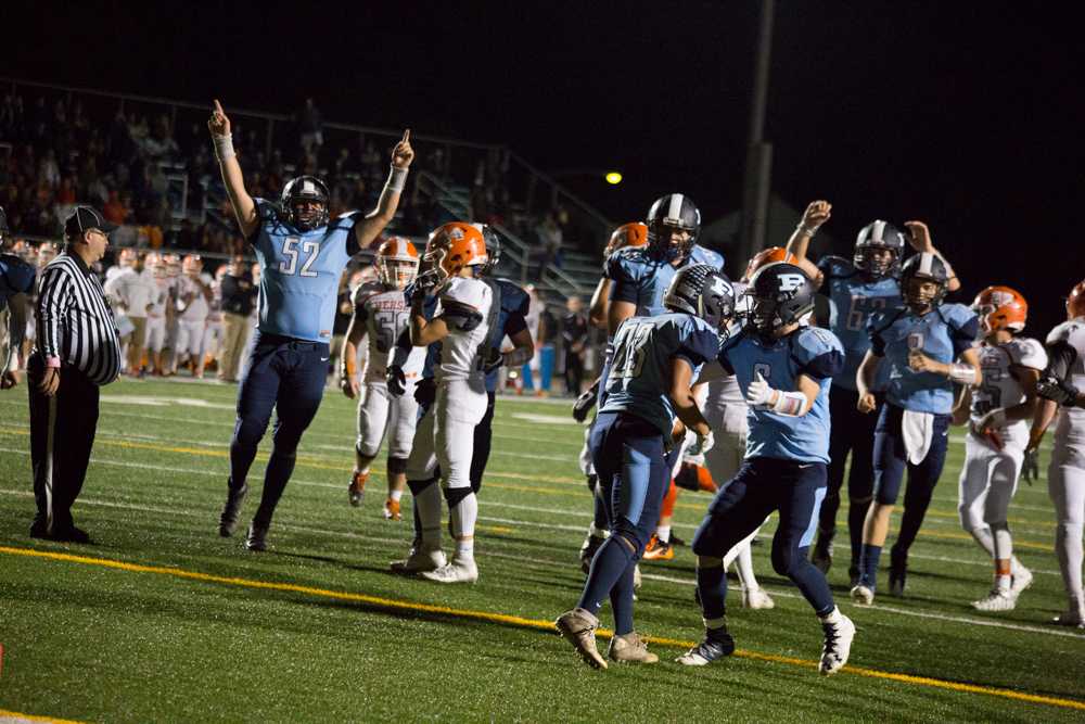 Knights football falls to Huskies