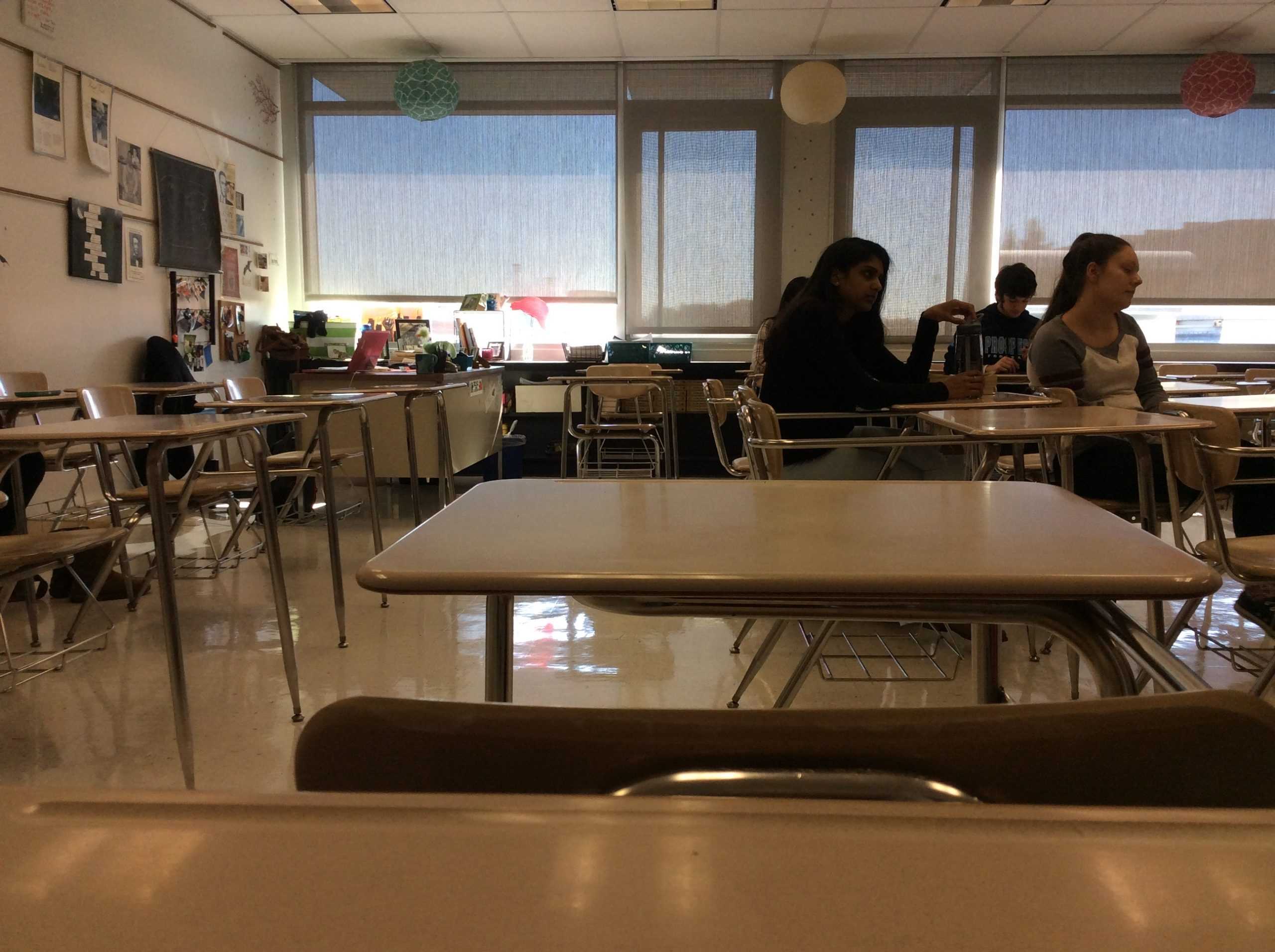 Sophomore Kathleen Gault takes this picture of the empty desks during seventh period. Gault was one of the five people in her Honors World Literature Composition class. "I like how teachers get really personal with you when you're like the one person in your class," Gault said.