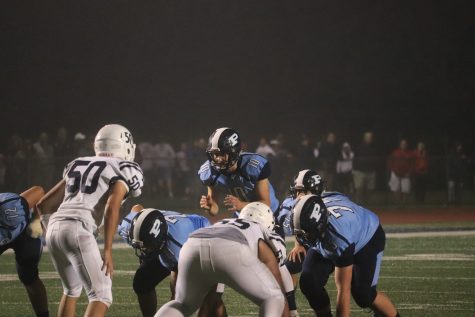 Strong first half helps football knock off Deerfield