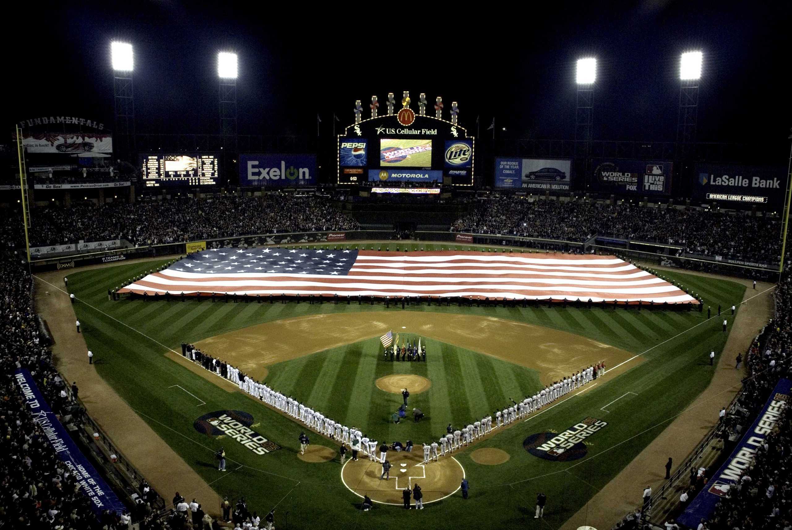 051022-N-1592S-001
Chicago, Ill. (Oct. 22, 2005) Ð One hundred twenty-five Sailors from Naval Station Great Lakes unfurl the Stars and Stripes during the singing of the National Anthem before 41,206 fans for the opening game of this years World Series, pitting the Chicago White Sox against the Houston Astros. The series is the White SoxÕs first in 88 years. U.S. Navy photo by Hospital Corpsman 1st Class Dwayne Snader (RELEASED)