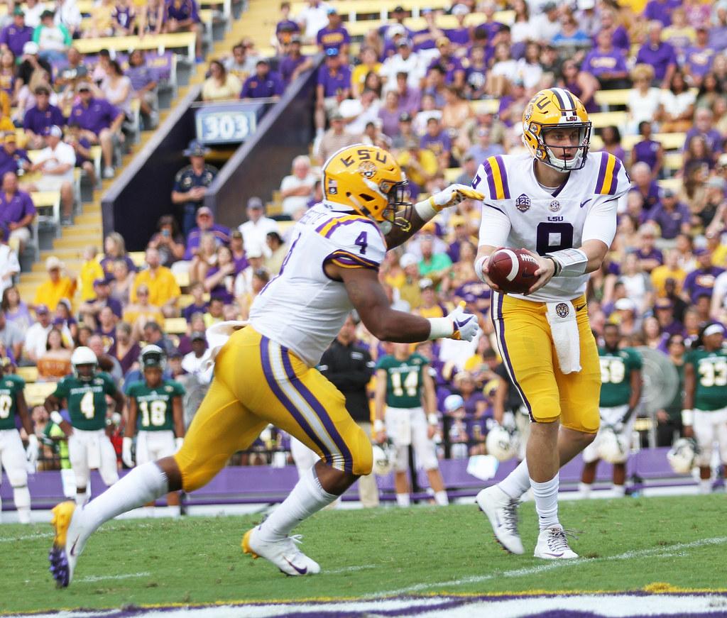 LSU quarterback #9, Joe Burrow, hands off to running back Nick Brossette #4, SELU vs LSU at Tiger Stadium, September 8th 2018, Tammy Anthony Baker, Photographer