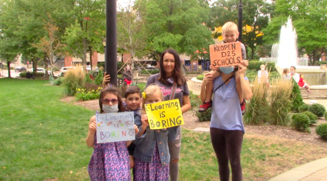 HUNDREDS RALLY TOGETHER IN A FIGHT TO REOPEN SCHOOLS