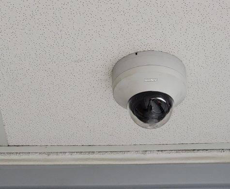 A Prospect security camera keeps a watchful eye over the Band-Arts hallway