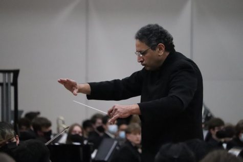 Director of Orchestra at Southern Illinois University Edwardsville Dr. Michael Mishra leads as the guest conductor for the Honors Orchestra. 