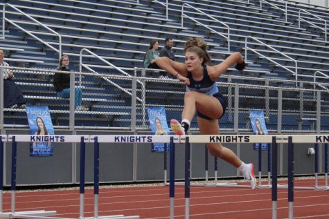 Katherine Lytle (Jr.) defeats all other competition taking first in the 100 hurdles race. All photos taken at the Elk Grove, Schaumburg, Prospect tri-meet on Tuesday, April 12th by Alyssa Degan.