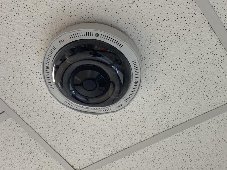 Tech+staff+updates+security+cameras