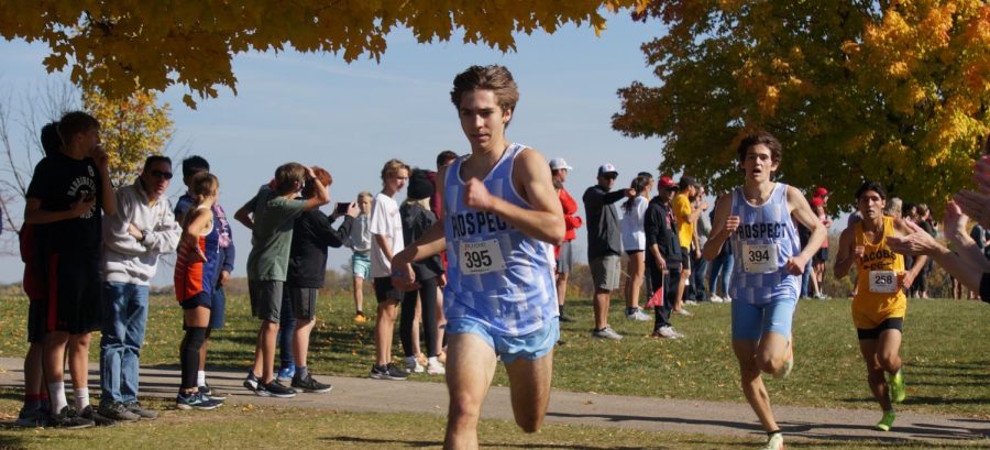 Luka Kuzmanovic (left) and Andrew Katsogianos (right) race to the finish in the IHSA Regional meet to qualify the varsity team for sectionals. (Photo courtesy Rebecca Pentikainen)