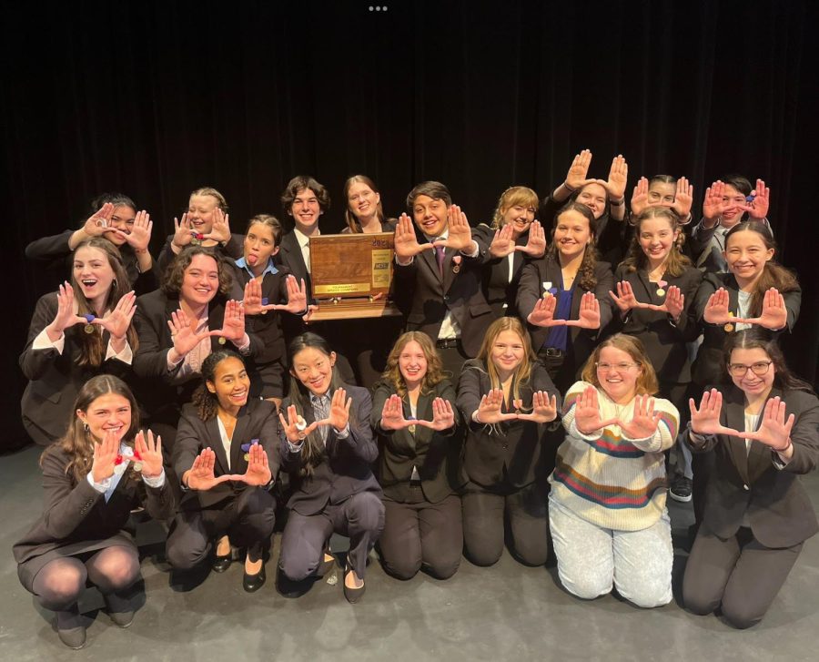 The team poses with their plaque after winning the MSL conference title. (Photo courtesy of Michael Piccoli)