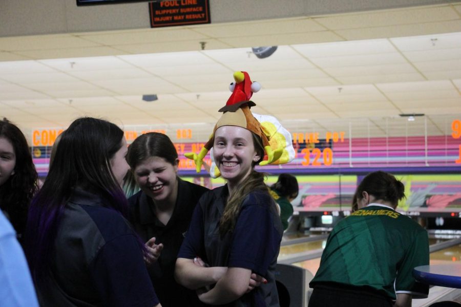 Emily+Biondo+wears+the+turkey+hat+after+bowling+three+strikes+in+a+row.+%28Photo+by+Alyssa+Degan%29