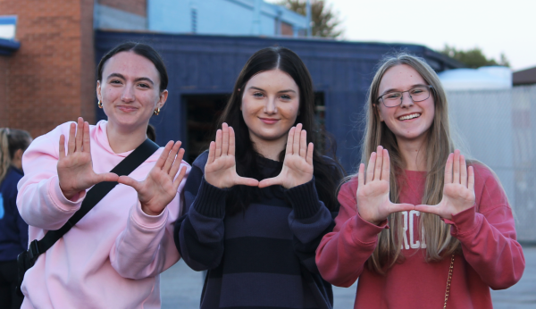 Sophomores Maria Hristeva, Mina Bandic, and Emilia Burszczyk holding up the “U”.