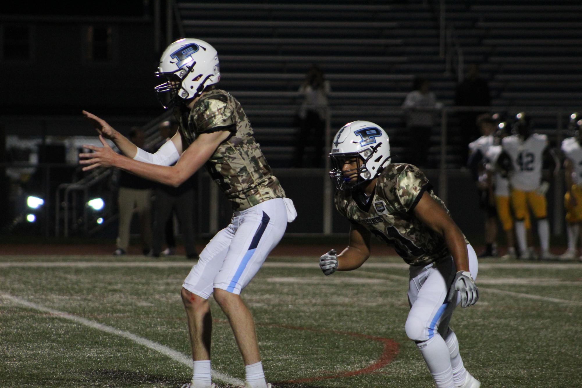 Knights celebrate victory against Glenbrook South while honoring National Guard