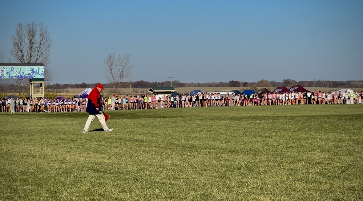 Girls Cross Country warming up for upcoming Nationals
