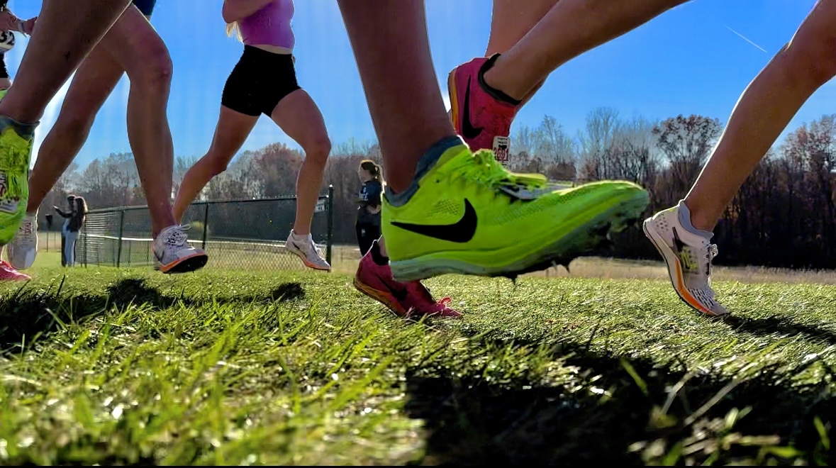 Girls Cross Country warming up for upcoming Nationals