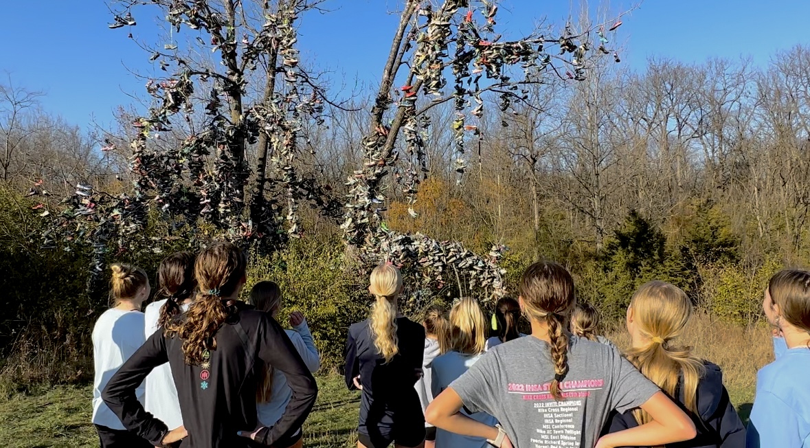 Girls Cross Country warming up for upcoming Nationals