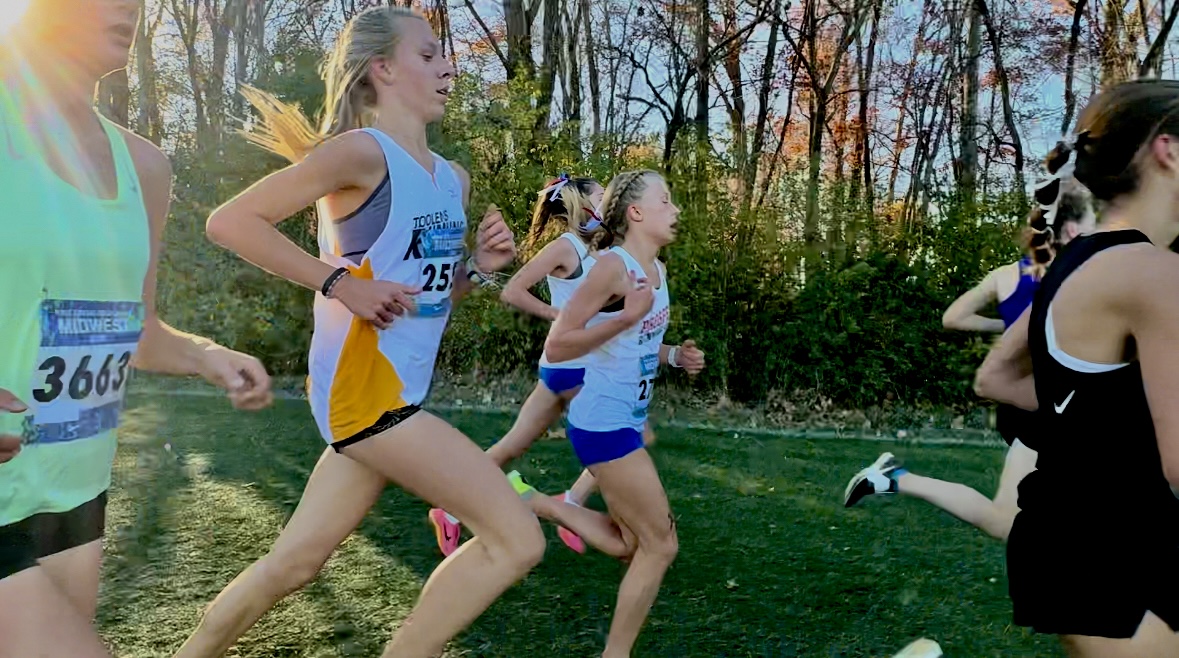 Girls Cross Country warming up for upcoming Nationals