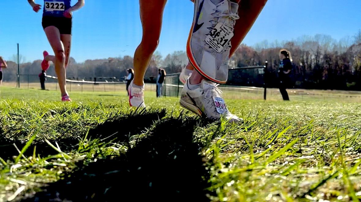 Girls Cross Country warming up for upcoming Nationals