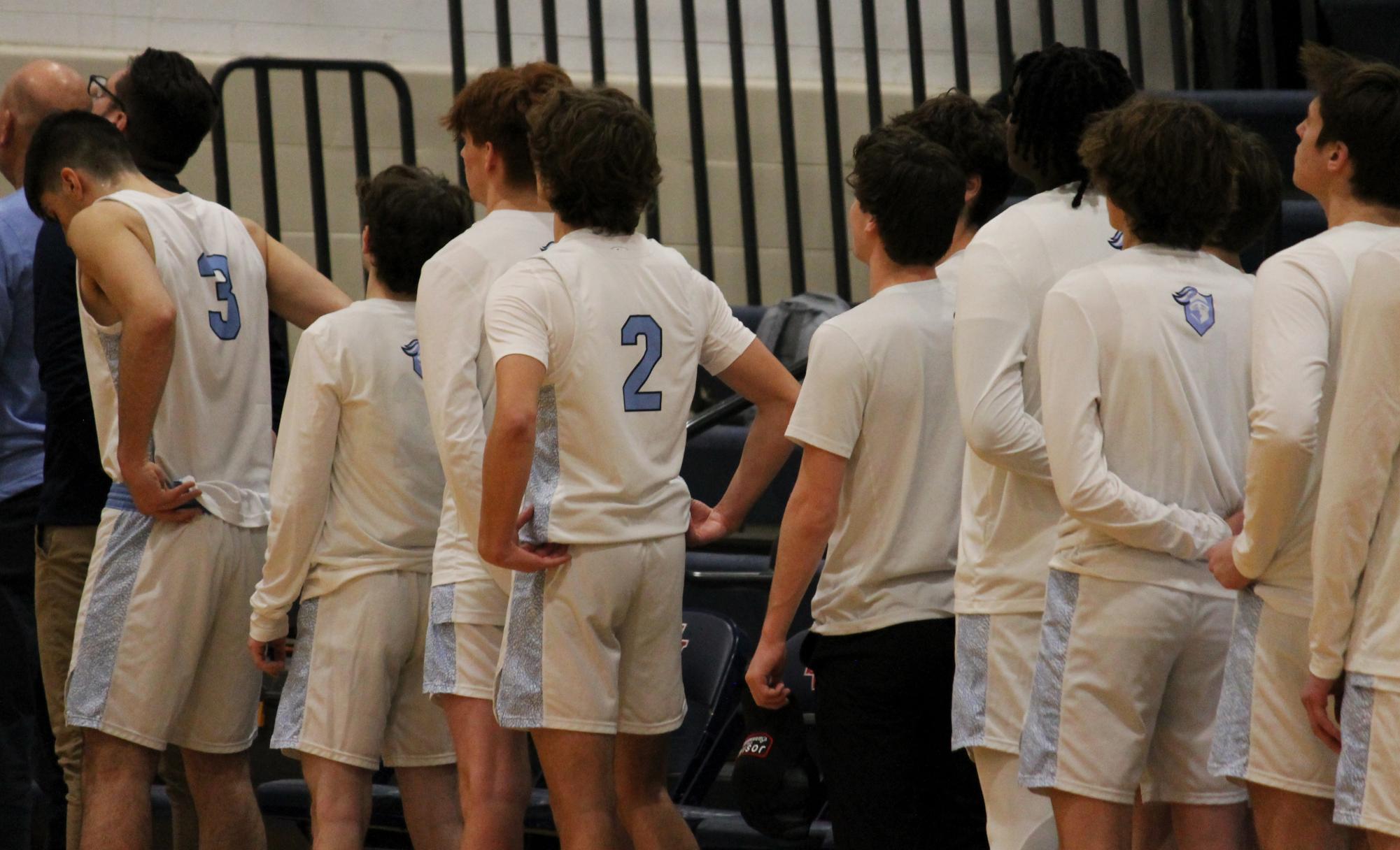 The Varsity Boys Basketball team at their last game of the St. Viator Tournament