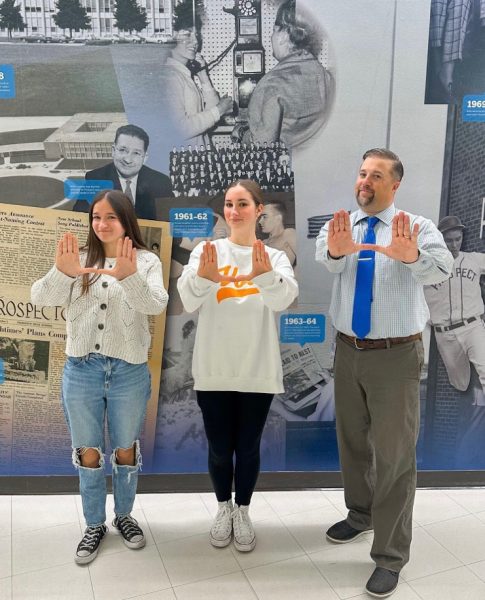 Running a president and vice president for the People’s Advocate Party, seniors Claire Stonitsch and Lilly Trylovich pose with psychology and law teacher Jay Heilman. As part of their campaign, Stonitsch and Trylovich had to earn endorsements from teachers, Heilman being one (photo courtesy of @peoplesadvocates on Instagram).