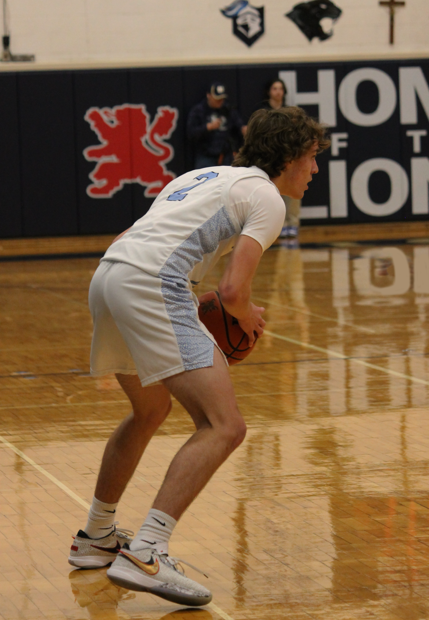 The Varsity Boys Basketball team at their last game of the St. Viator Tournament