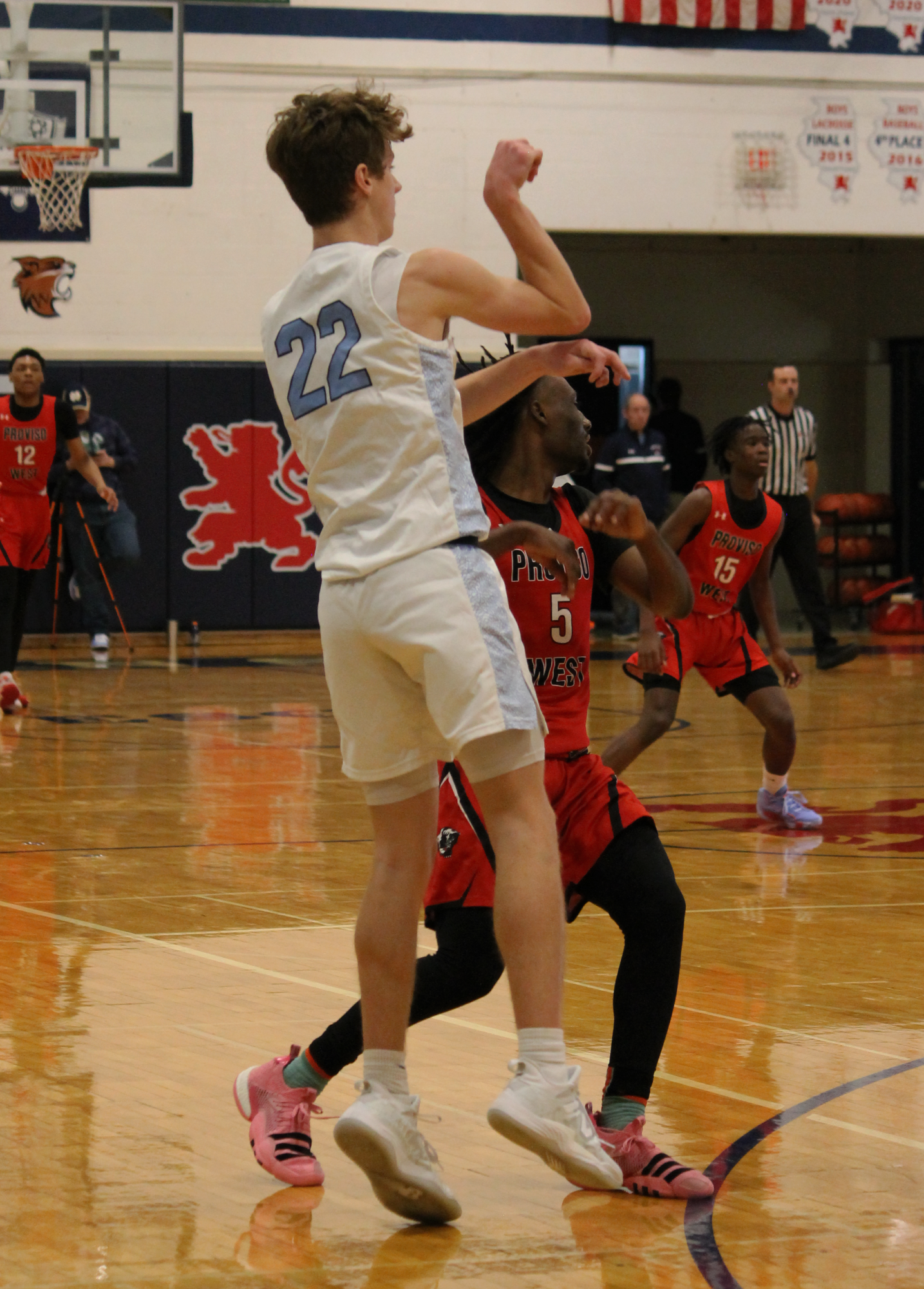 The Varsity Boys Basketball team at their last game of the St. Viator Tournament