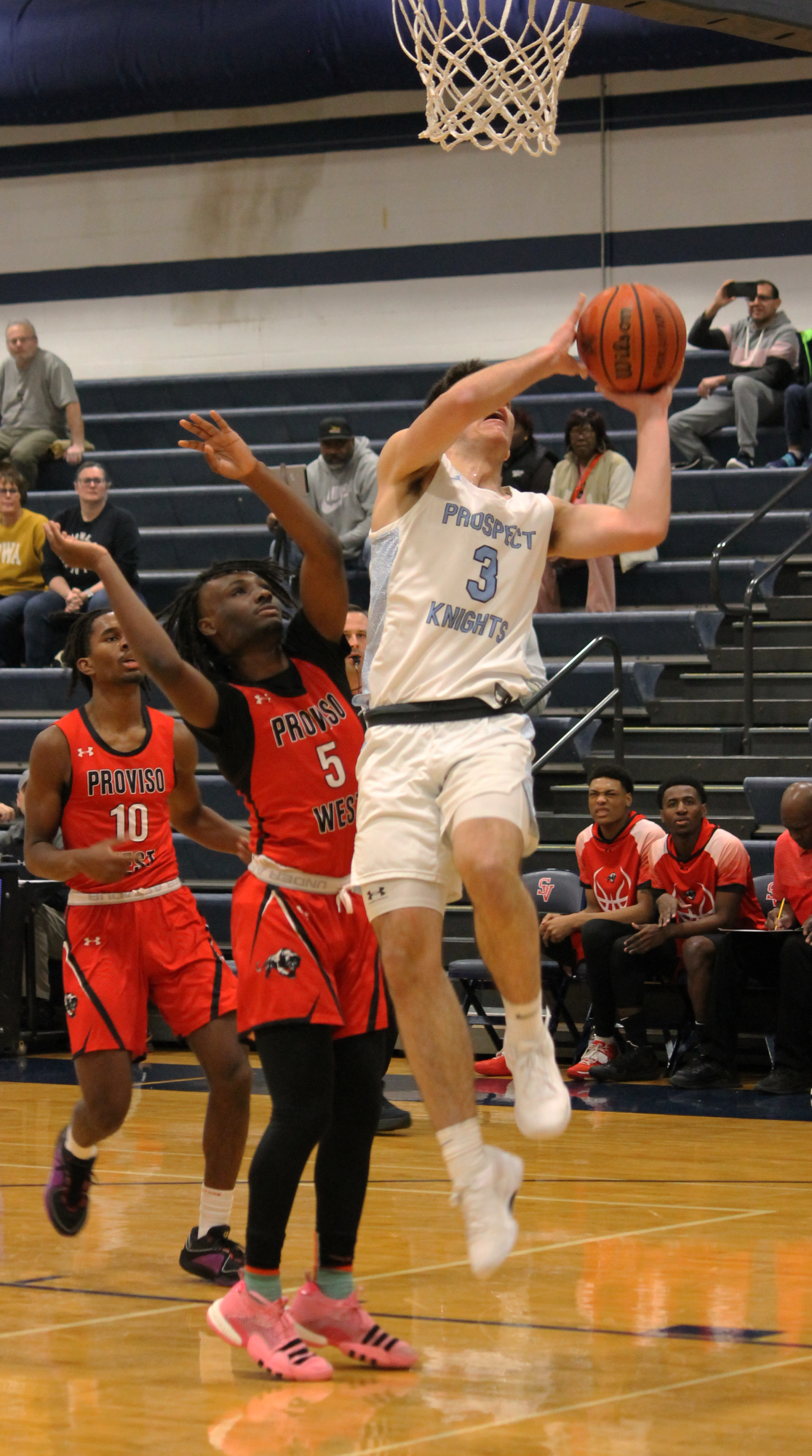 The Varsity Boys Basketball team at their last game of the St. Viator Tournament