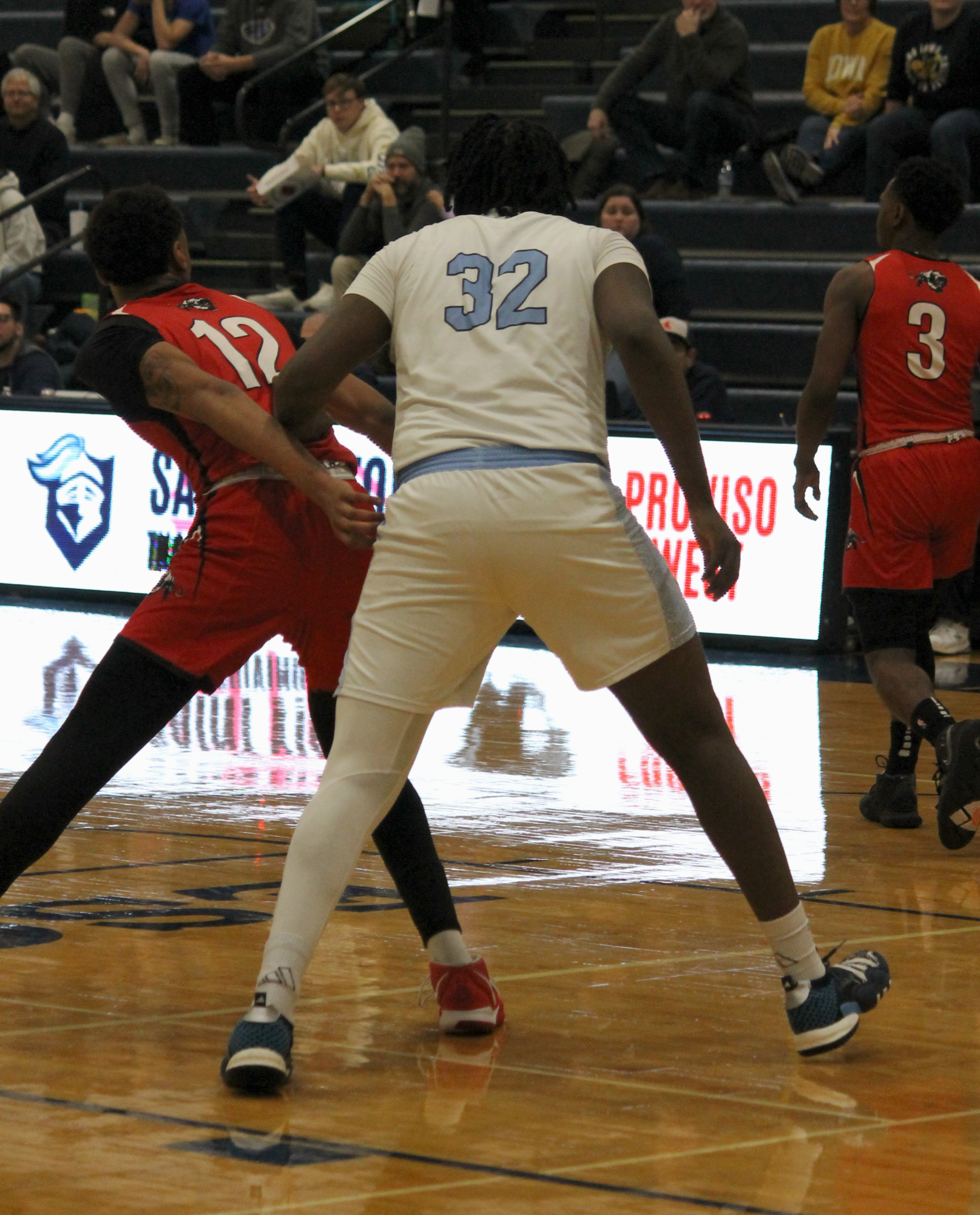 The Varsity Boys Basketball team at their last game of the St. Viator Tournament