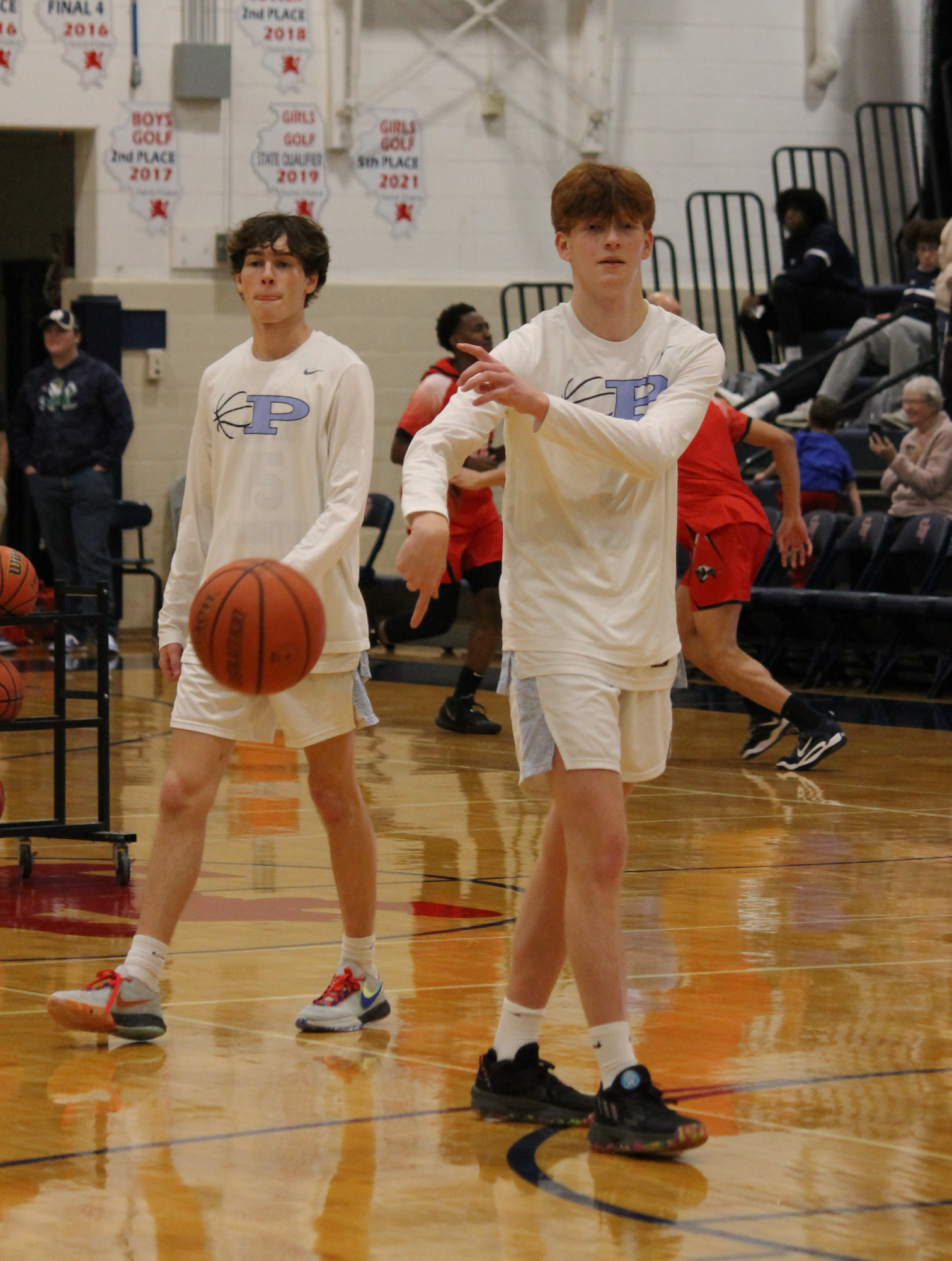 The Varsity Boys Basketball team at their last game of the St. Viator Tournament