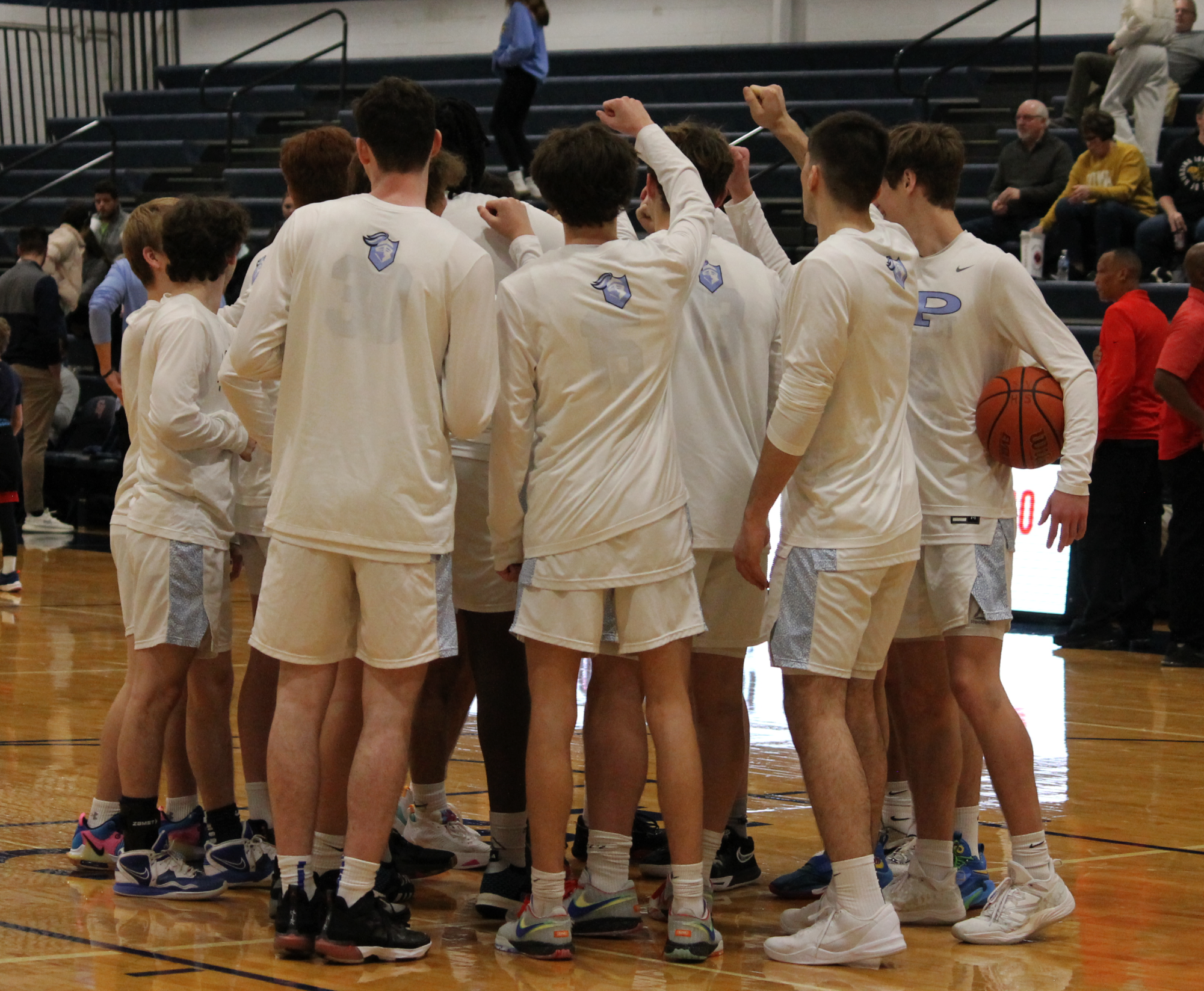The Varsity Boys Basketball team at their last game of the St. Viator Tournament