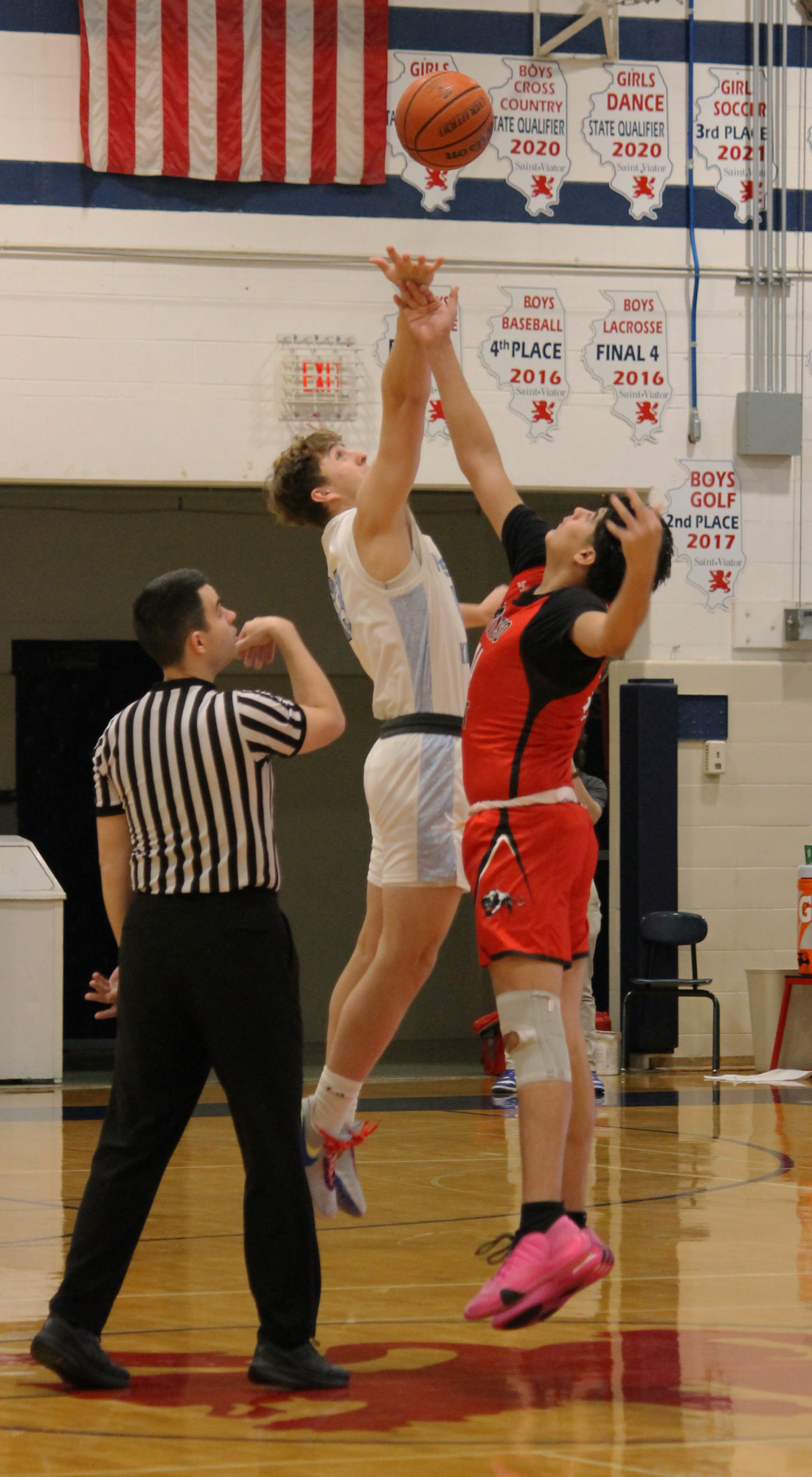 The Varsity Boys Basketball team at their last game of the St. Viator Tournament