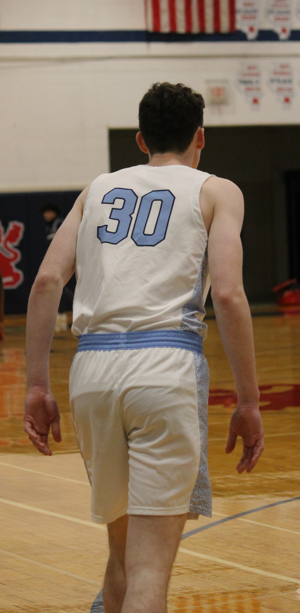 The Varsity Boys Basketball team at their last game of the St. Viator Tournament