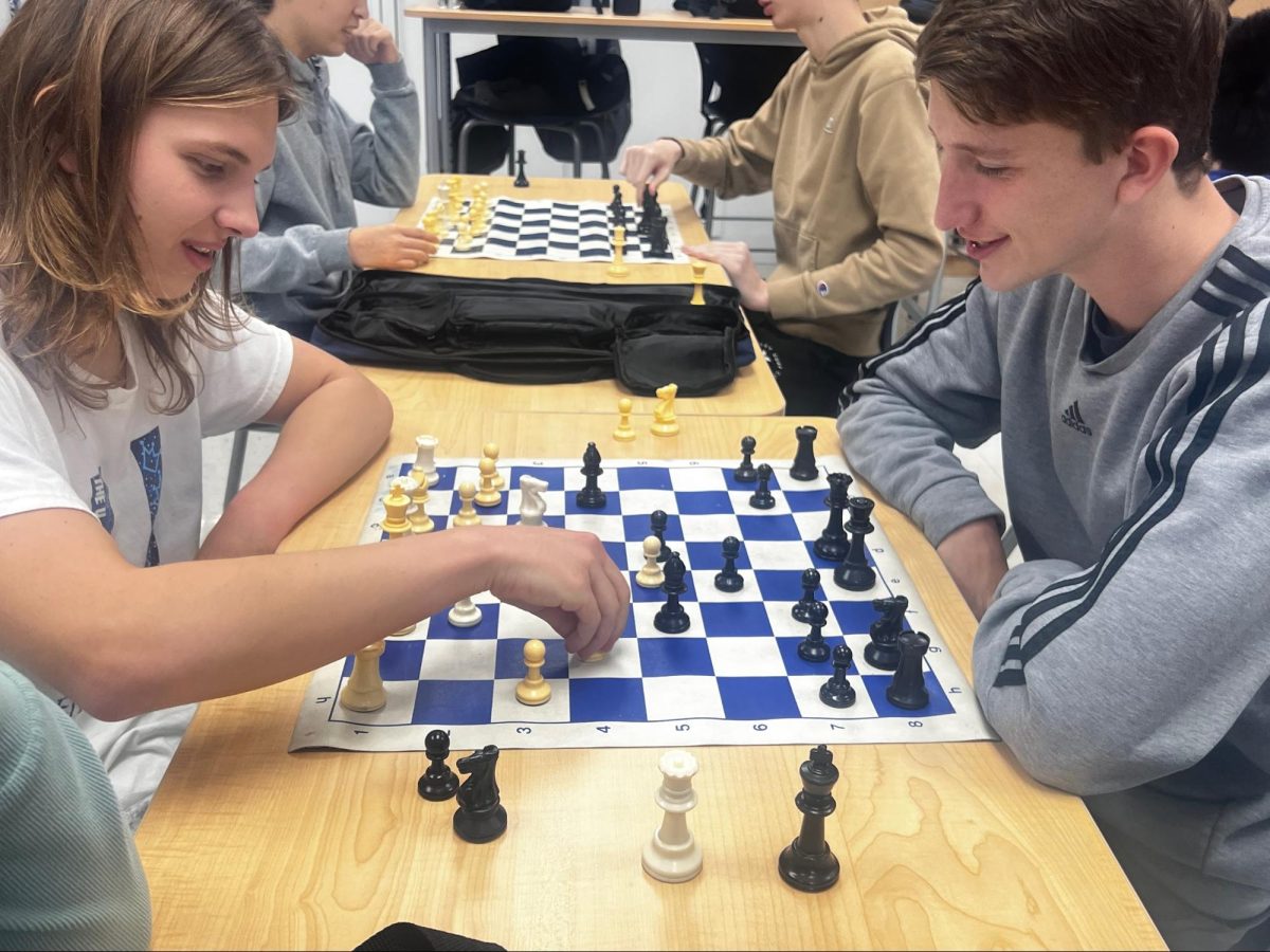 Senior+Daniel+Derengowski+plays+a+practice+chess+game+against+an+opponent+during+practice+on+Nov.+28.+%28Photo+by+Justin+Peabody%29.