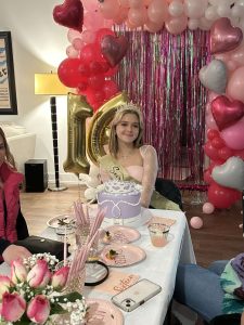 Sofia Kielczewski celebrates her leap year birthday with friends and a cake that has a 4 candle. (Photo courtesy of Sofia Kielczewski)