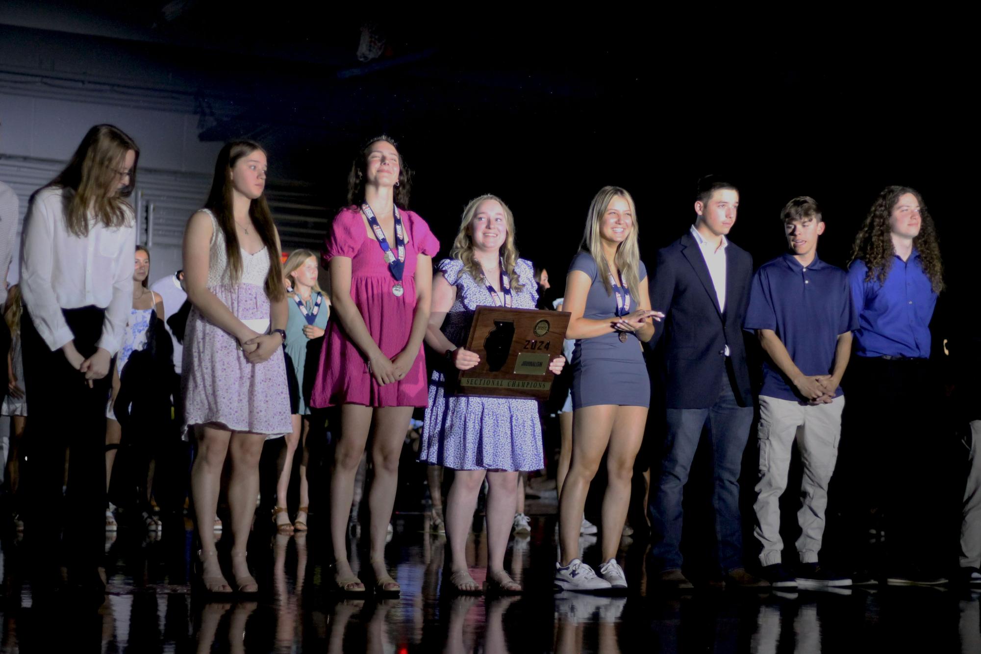 Spotlight Assembly Photo Album highlights achievements