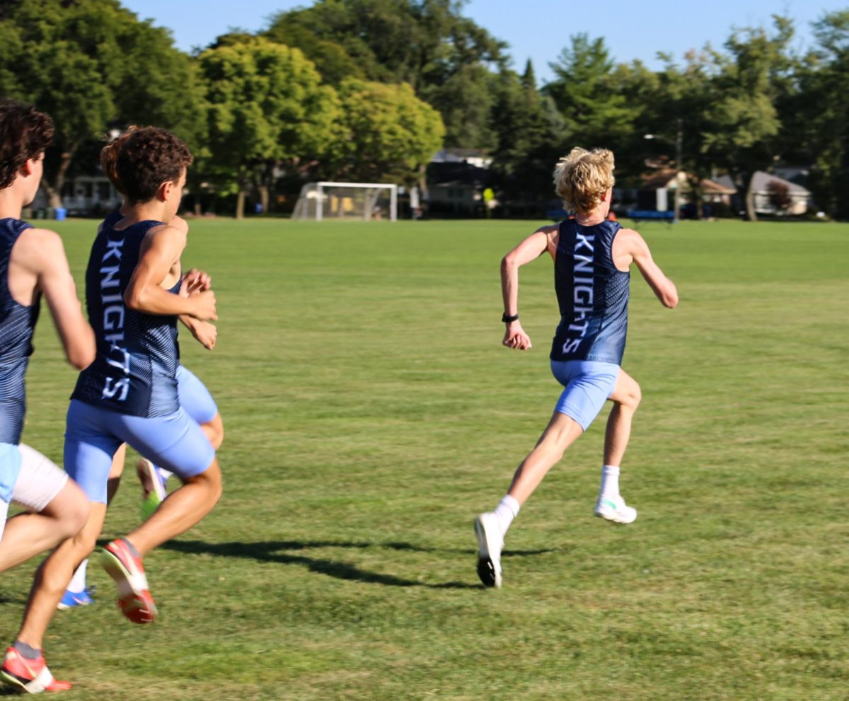 Freshman Bobby Wintermute takes the lead of 2.5 mile.