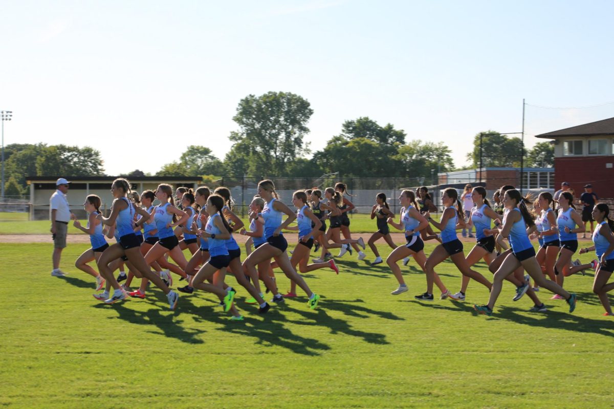 JV Cross Country girls start off running the 2.5 mile.