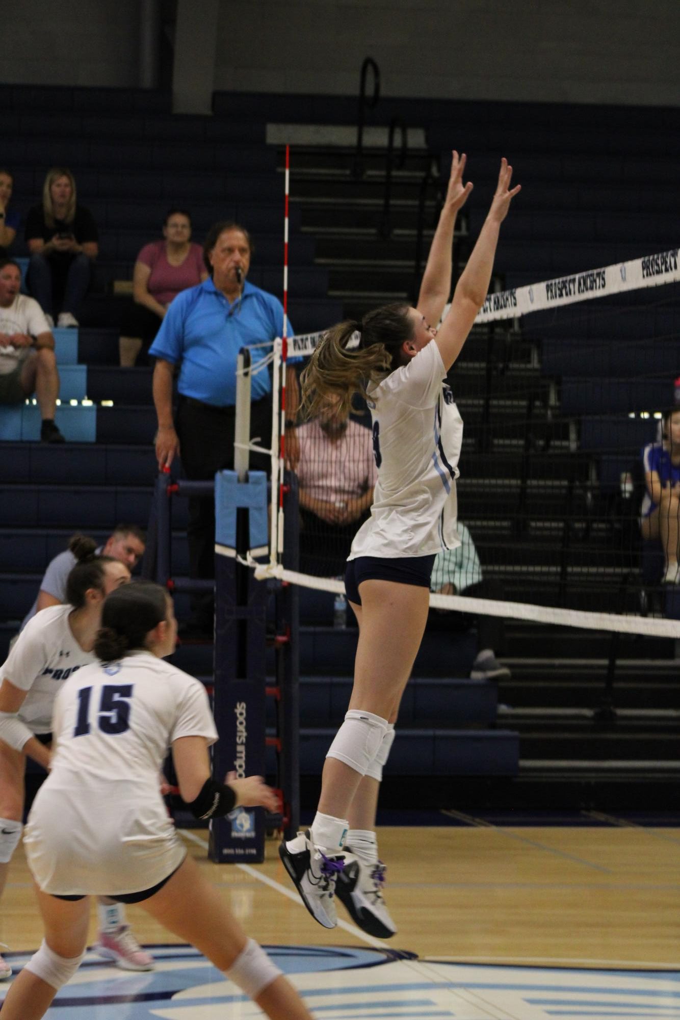 Junior Sam Skowronski blocking the ball.