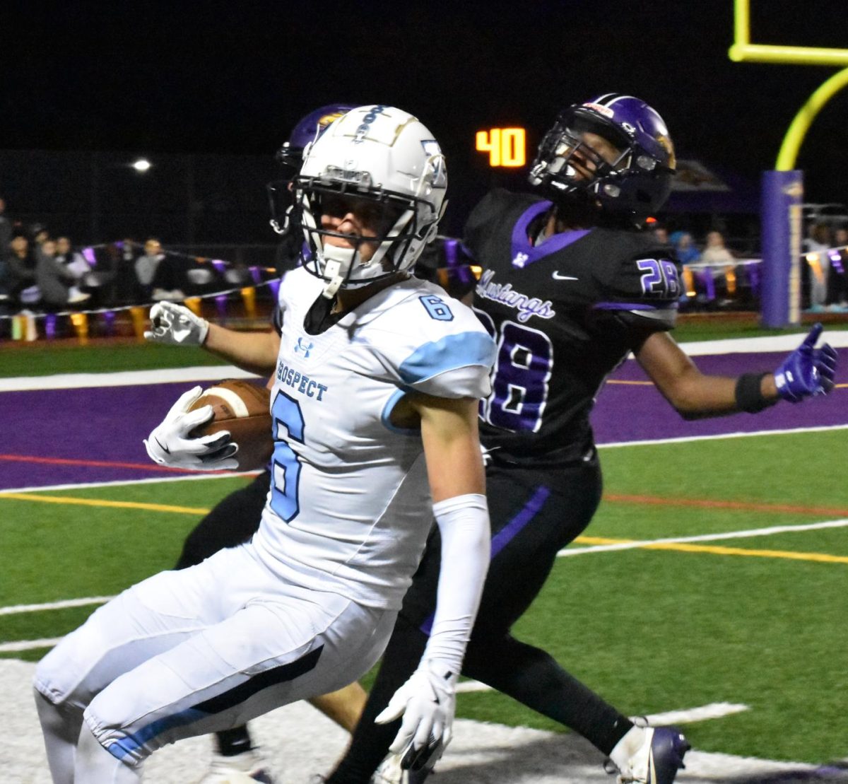 Junior Nate Cichy avoids defense with the ball.