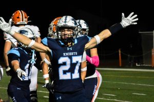 Junior Jackson Parrish celebrates after beating Hersey.