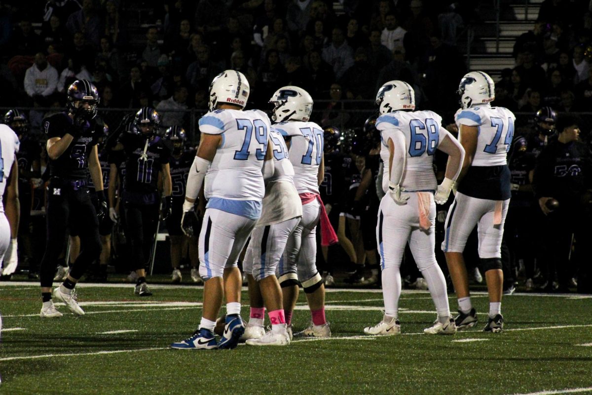 The prospect offensive line gets set for the start of play.