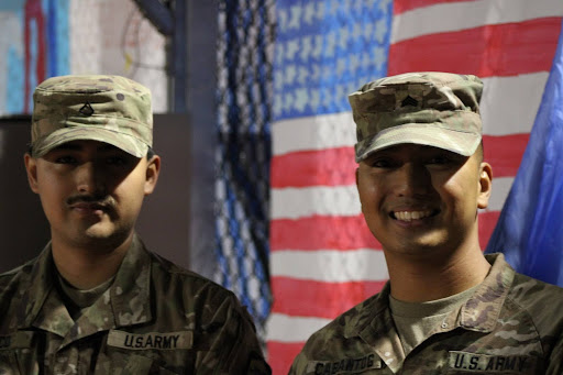  Private Rico (left) and Sergent Luigi Cabantog (right) on the sideline of the football game on Oct. 25