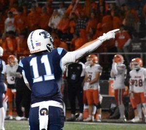 Senior JT Zei points down the field.