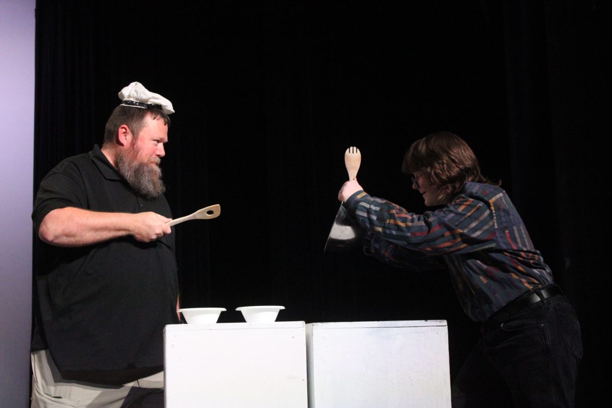 Technical adviser and teacher Thomas Ringrose plays the chef in a student skit.