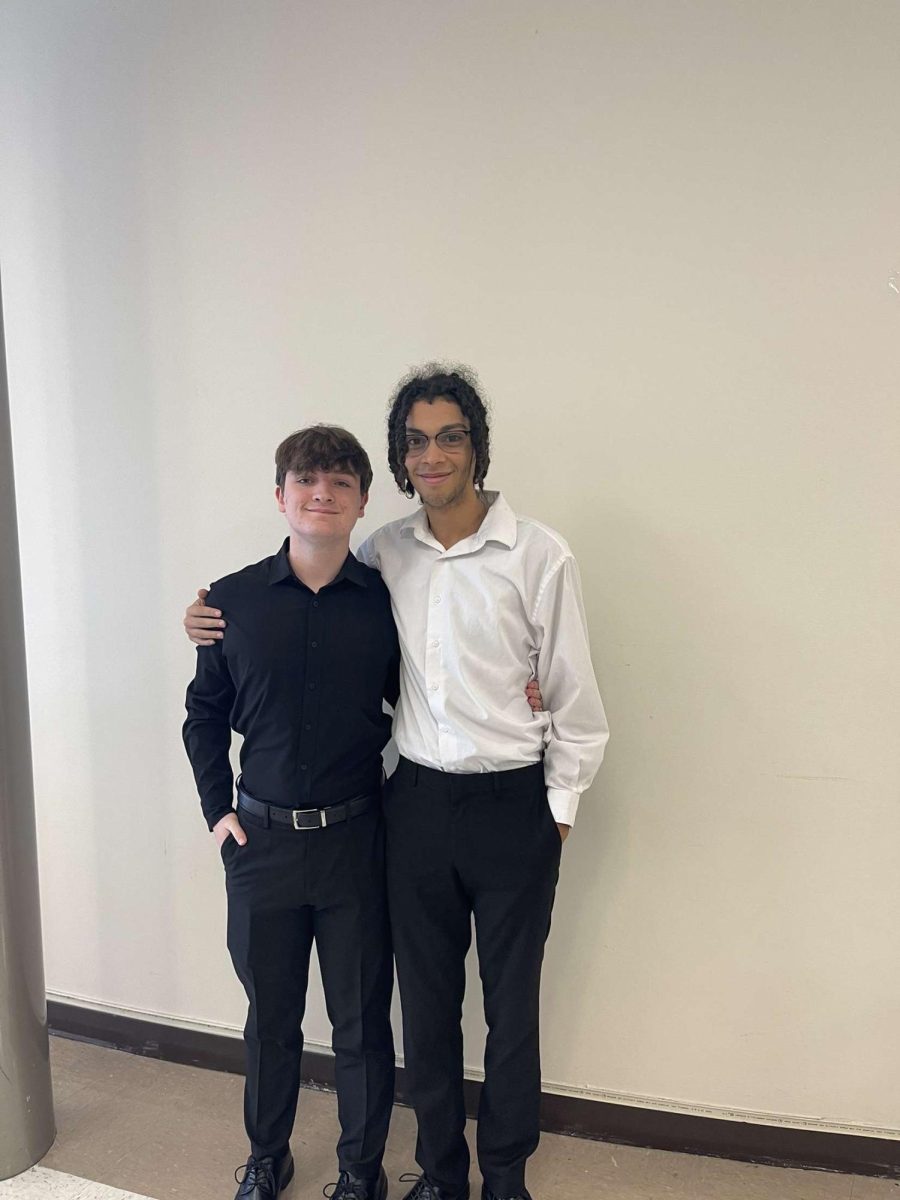 Senior Will Sieroslawski and junior Quanin Brooks sang in a Vocal Jazz performance for the Illinois Music Education Association (ILMEA) on Saturday Nov. 16. 