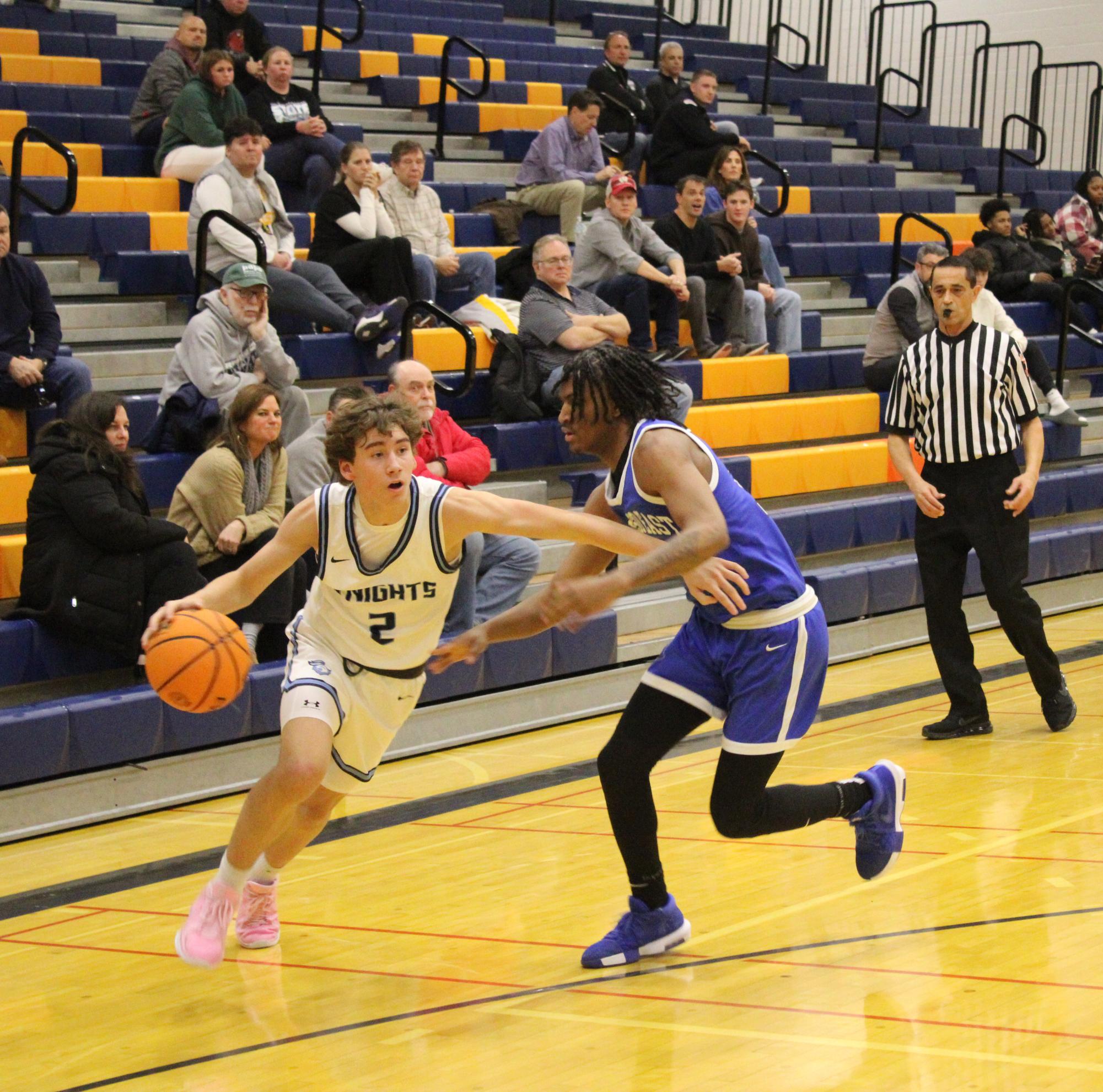 Boys basketball wins 63-59 over Proviso East during MSL/WSC crossover game