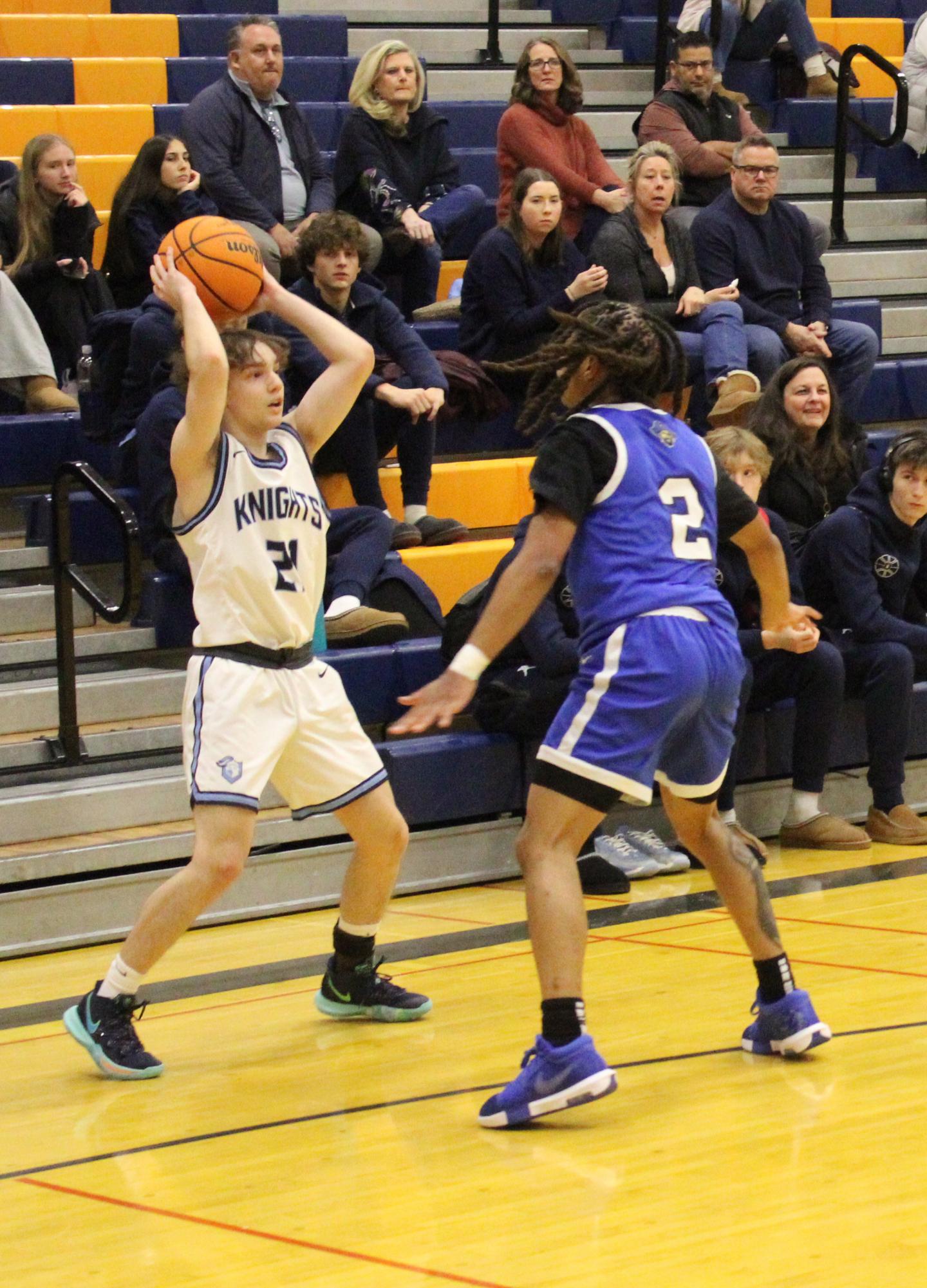 Boys basketball wins 63-59 over Proviso East during MSL/WSC crossover game